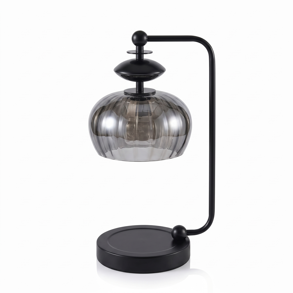 Black candle warmer lamp with smoky glass shade on a white background