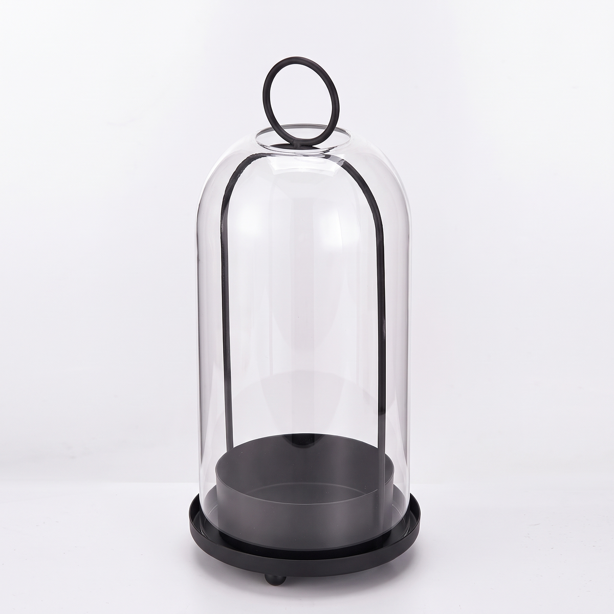 Black glass dome candle lantern on a white background