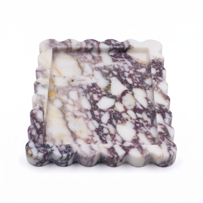 Calacatta Viola scalloped marble tray on a white background
