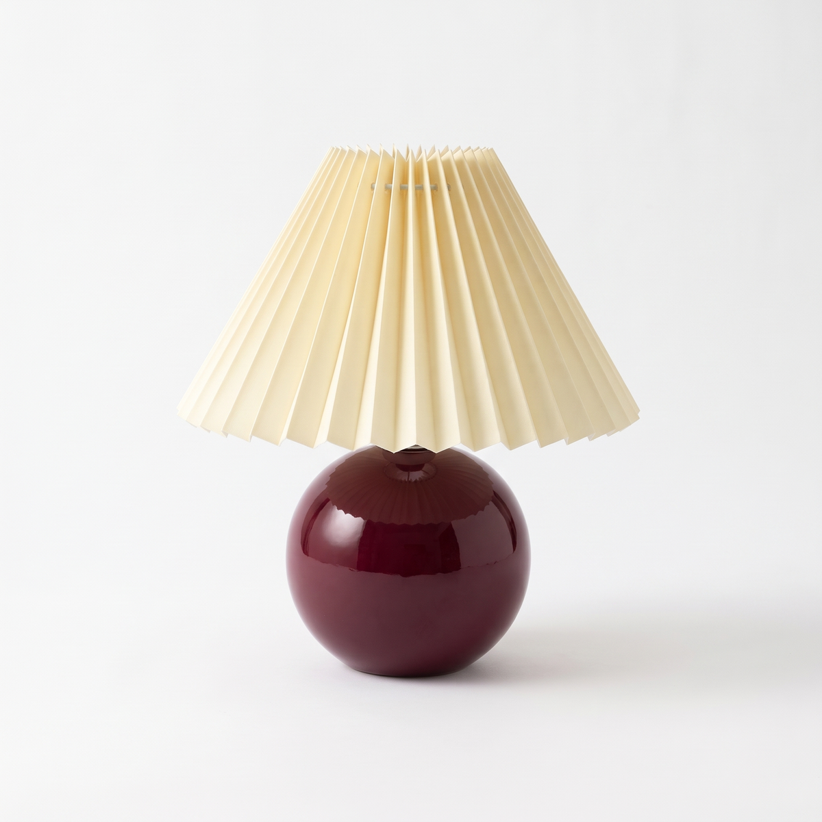 Ceramic lamp with pleated shade – Burgundy Base, Yellow Shade, on a white background