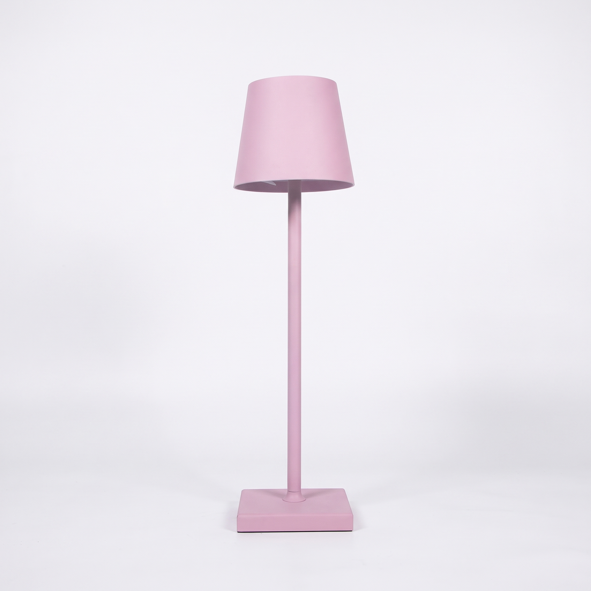 Cordless table lamp – Pink, on a white background
