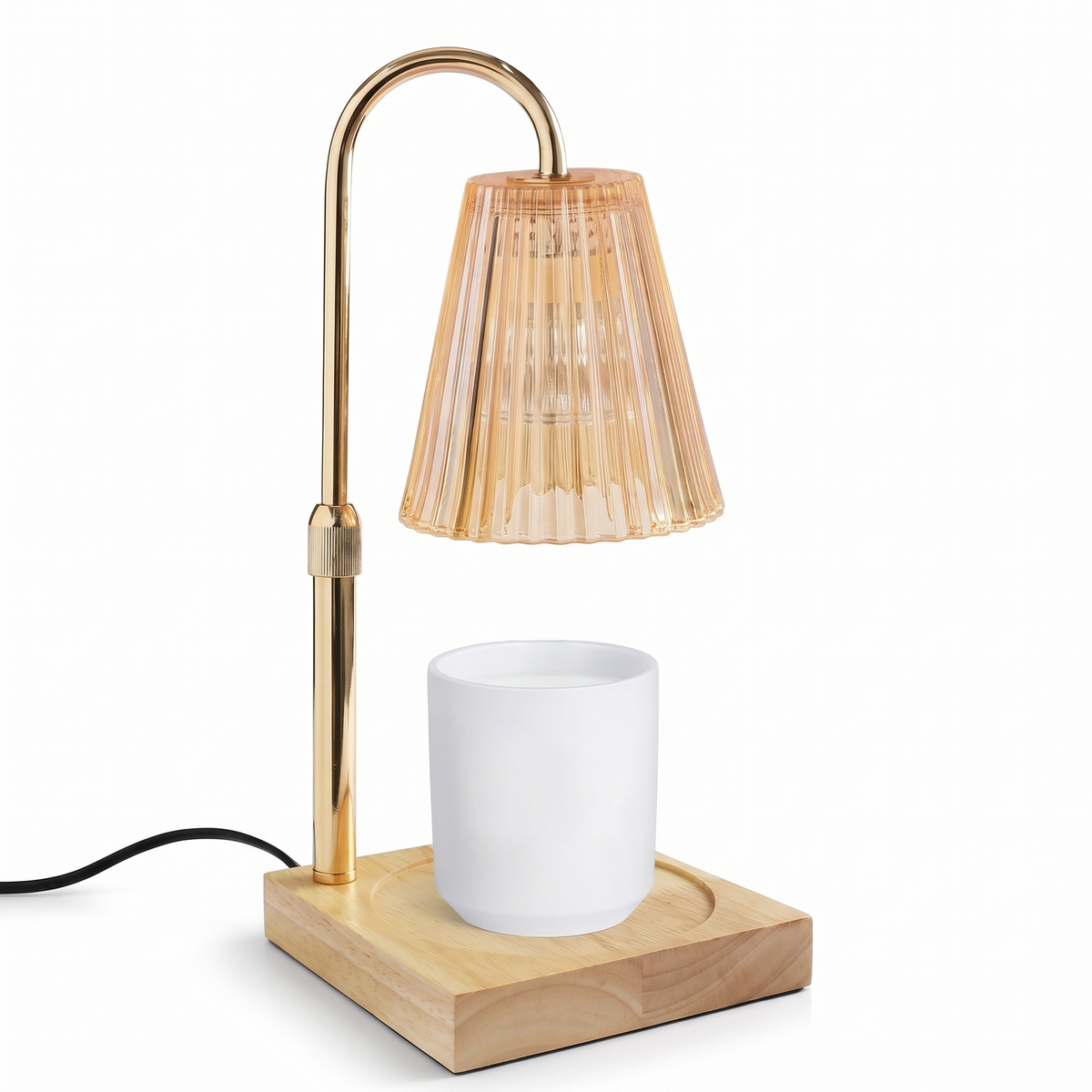 Gold candle warmer lamp with wooden tray on a white background