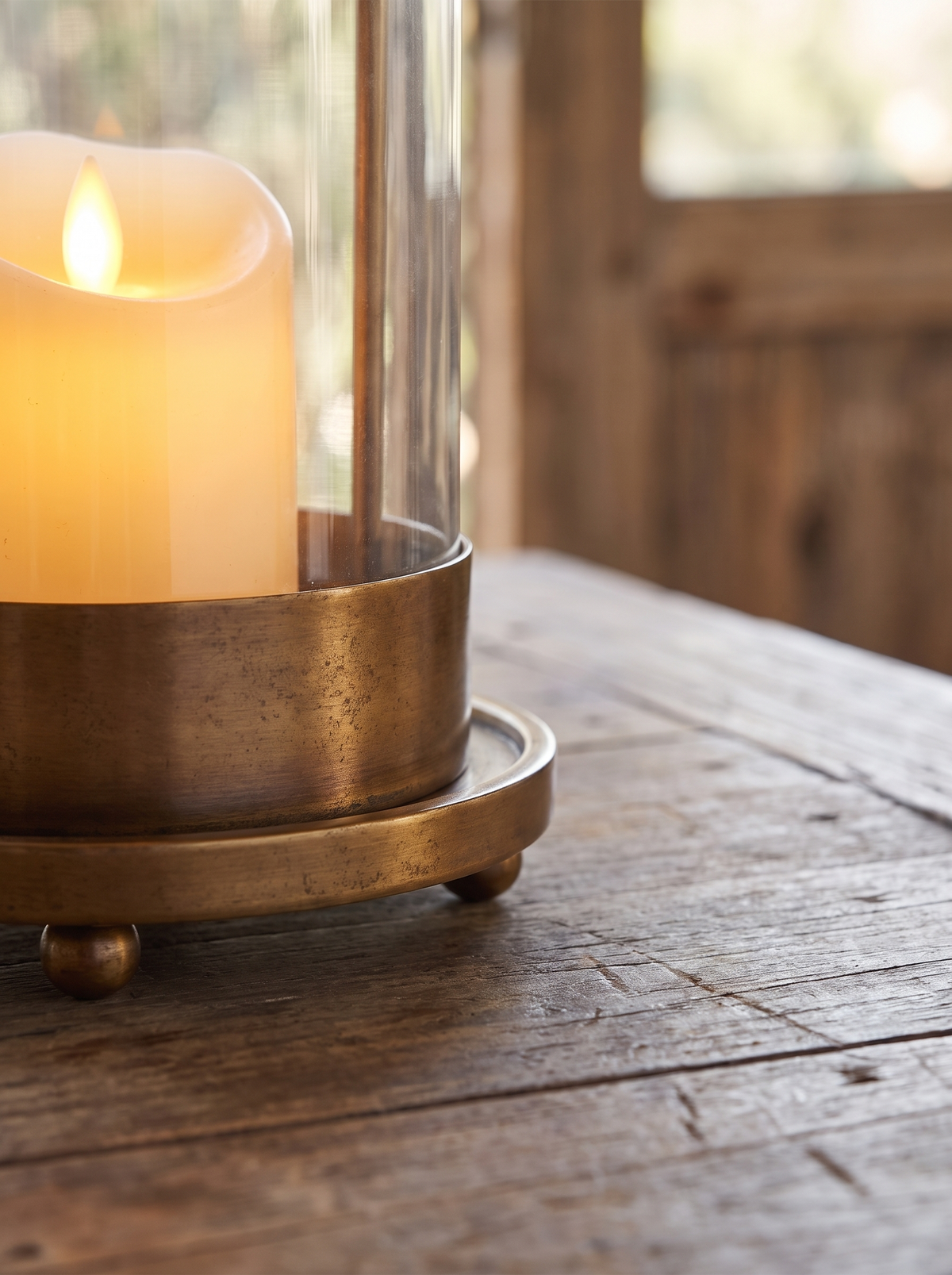 Close view of a vintage brass candle stand base