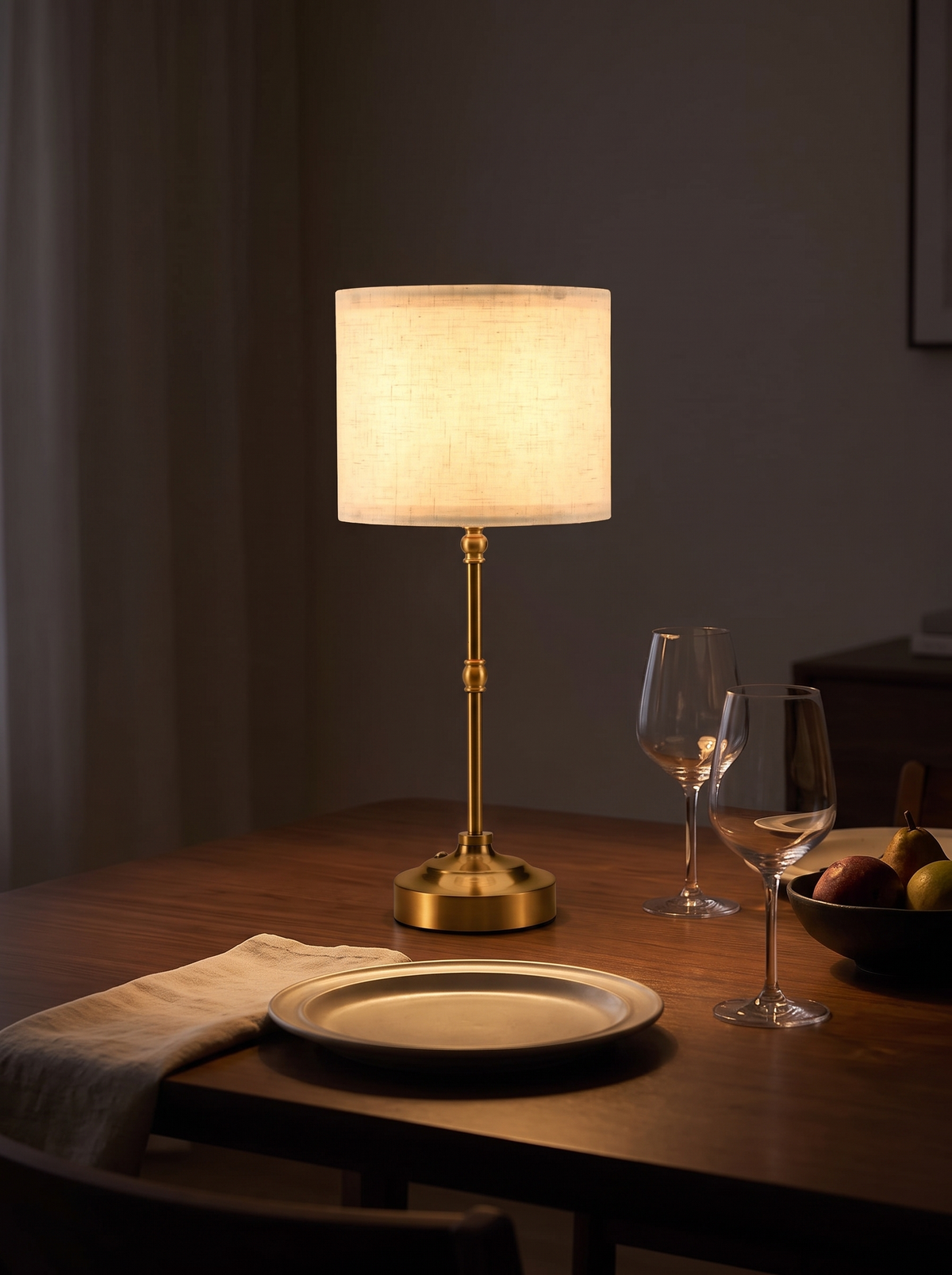 Cordless lamp lighting a dining table at night