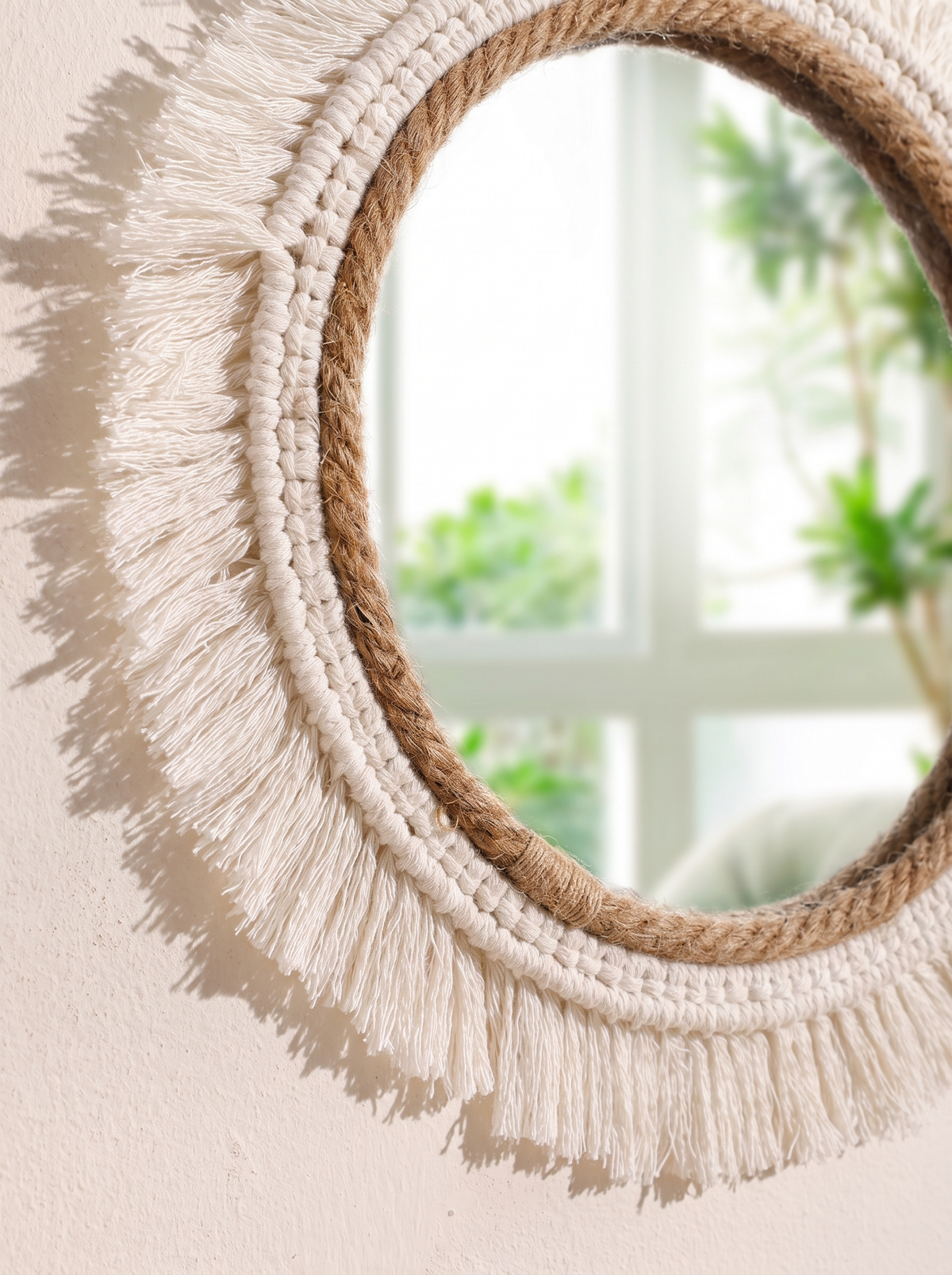 Close view of handwoven fibre around a mirror