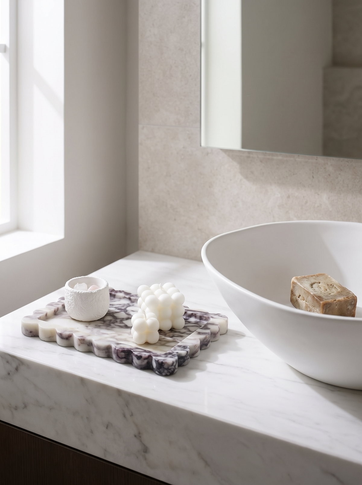 Marble tray with soap beside a basin