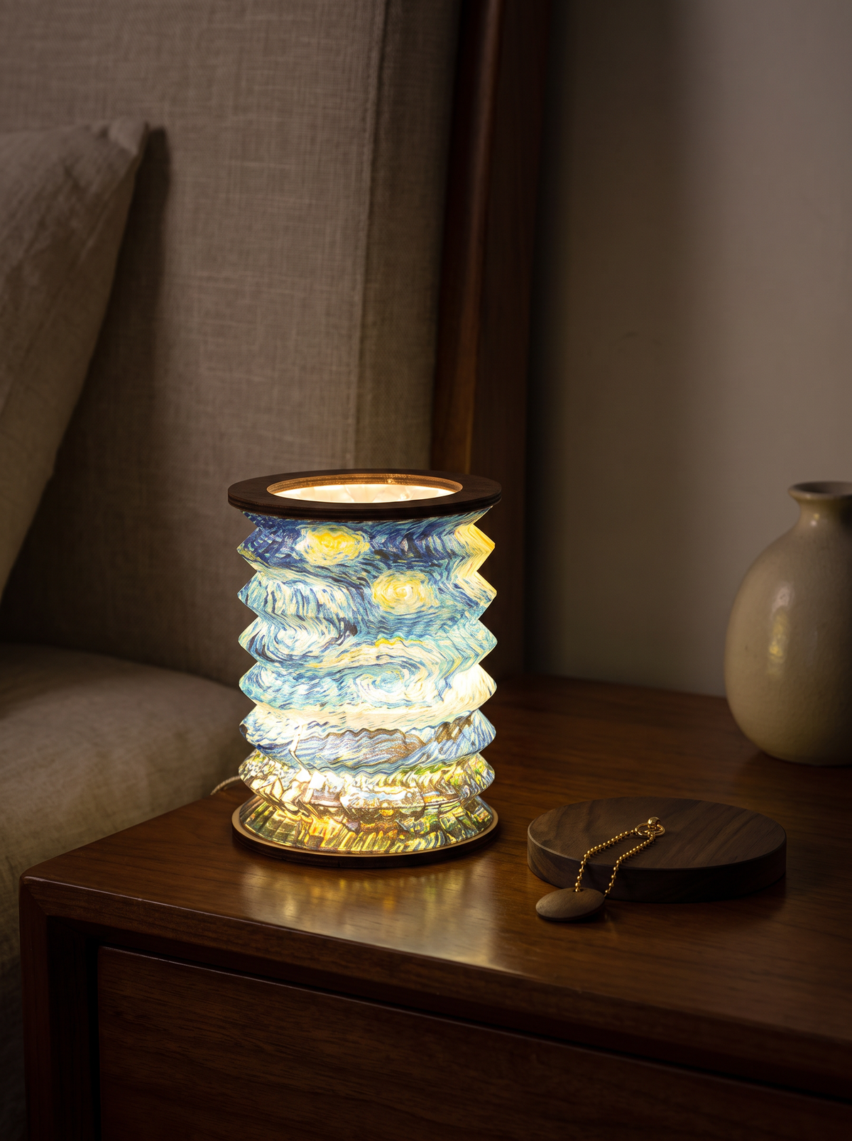 Folding wooden lantern lamp glowing at the bedside