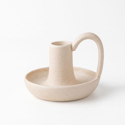 Minimal ceramic taper candle holder with handle – Beige, on a white background