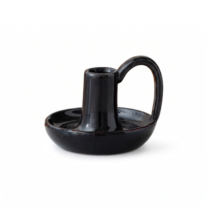 Minimal ceramic taper candle holder with handle – Black, on a white background