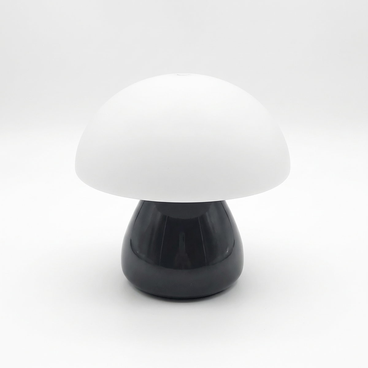 Mushroom LED night lamp on a white background