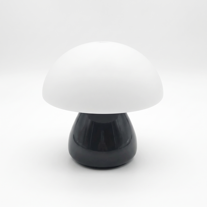 Mushroom LED night lamp on a white background