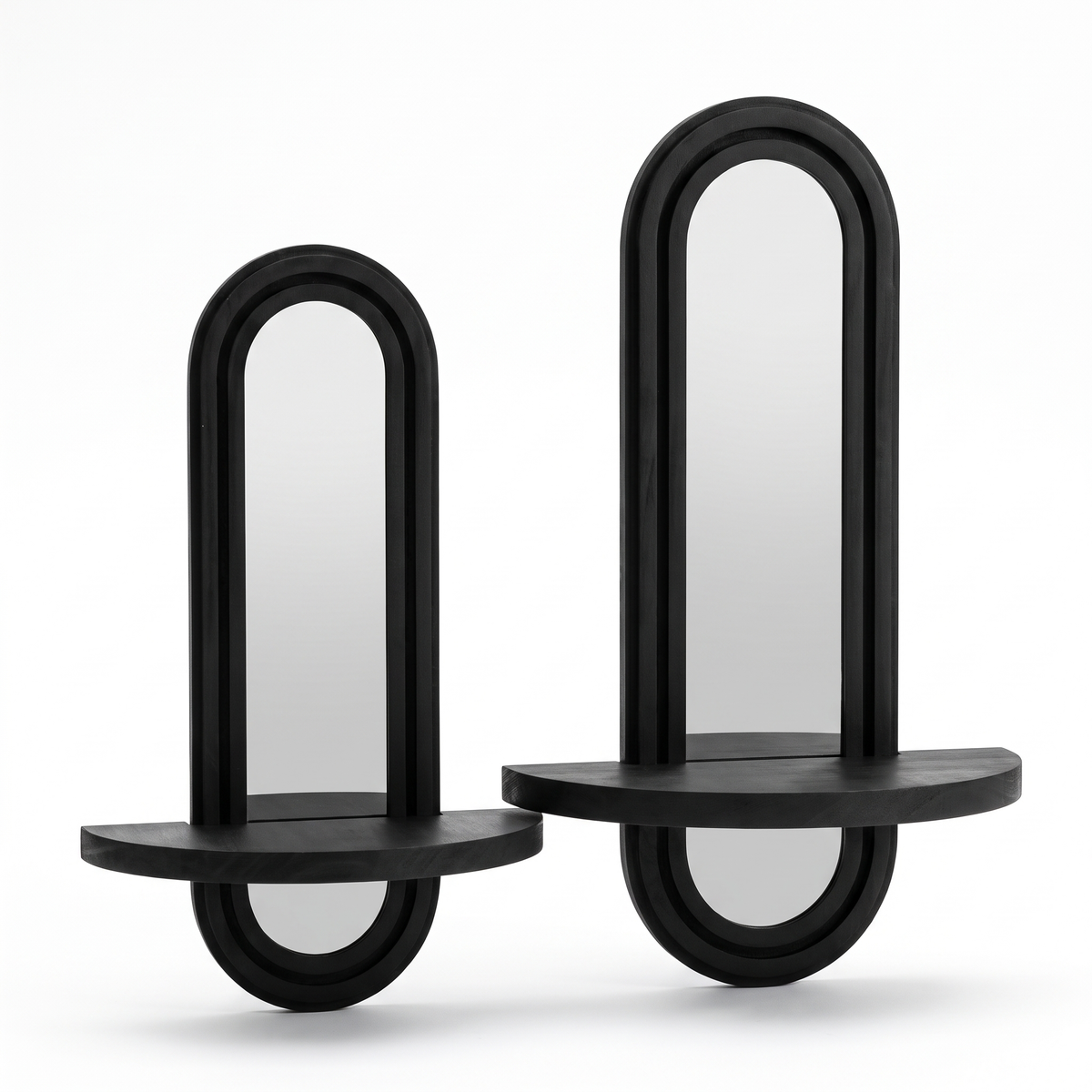 Set of two black arched wall mirrors with shelves on a white background