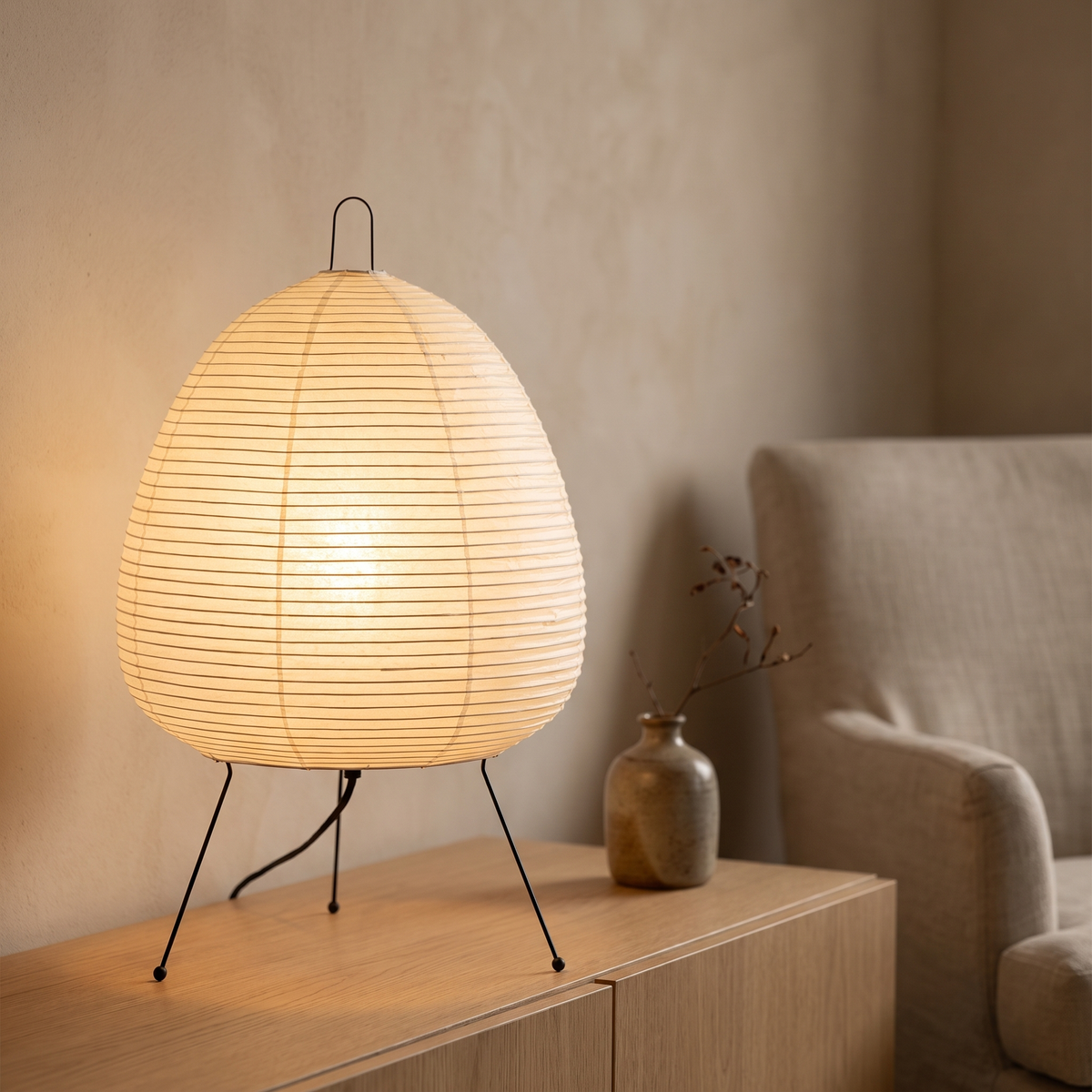 Wabi-sabi rice paper lantern table lamp displayed in a warm modern interior