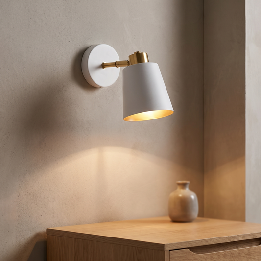 White swing-arm wall sconce displayed in a warm modern interior