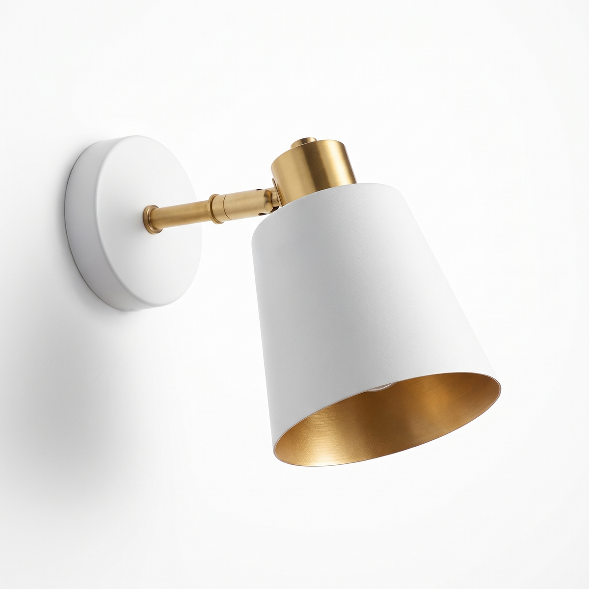White swing-arm wall sconce on a white background